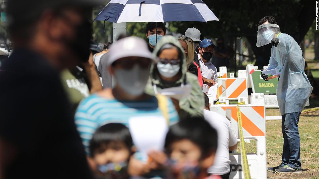 MIAMI GARDENS, FLORIDA - JULY 06: Cars are seen as the drivers wait to be tested for COVID-19 at the COVID test site located in the Hard Rock Stadium parking lot on July 06, 2020 in Miami Gardens, Florida. Florida is experiencing a spike in cases of people with the coronavirus and has put plans in place to close some businesses to combat the rise. (Photo by Joe Raedle/Getty Images)