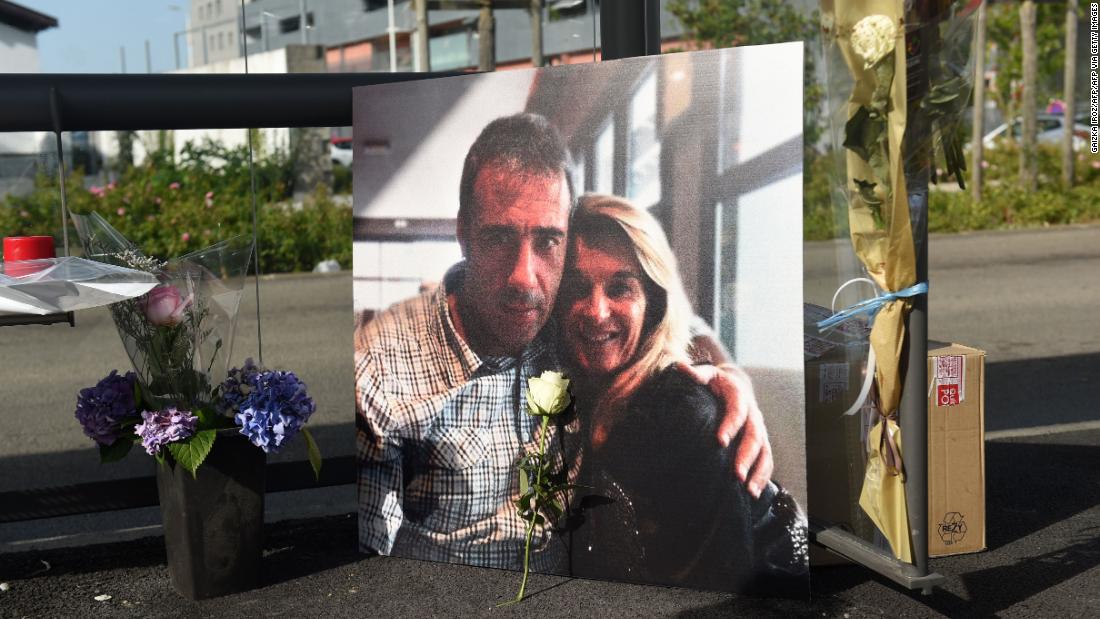 Veronique Monguillot, second left, mourns the death of her late husband Philippe on July 8 in Bayonne.