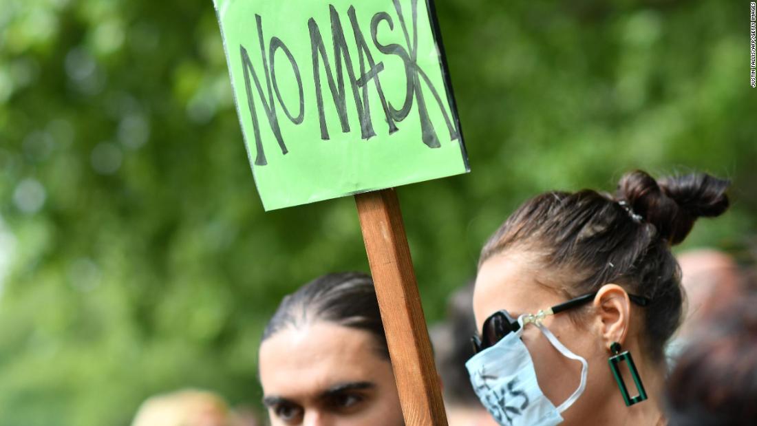 A protester holds up a placard at the London rally on Sunday.