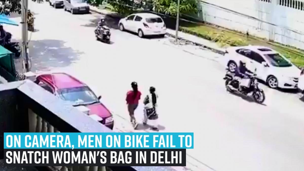 On camera, men on bike fail to snatch woman