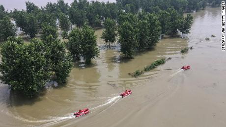 & # 39; Alles is weg. & # 39;  Overstromingen in China ruïneren boeren en riskeren stijgende voedselprijzen